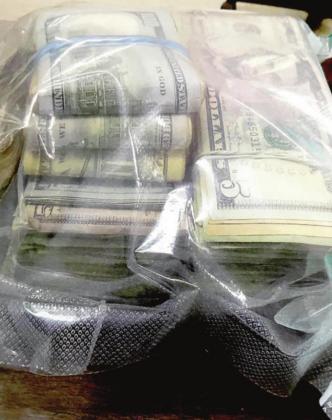 Men charged with money laundering, meth possession