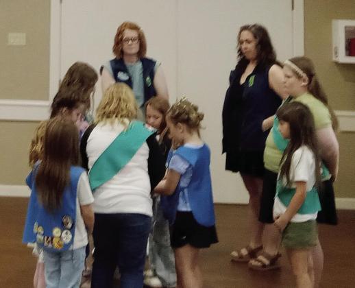 Troop 2252 scouts fold a flag during the flag retirement ceremony. Troop 2252 scouts fold a flag during the flag retirement ceremony.