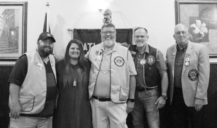 District Governor Jimmy Cox visited Atlanta Lions Club last week to initiate and induct new members into the club officially. New Journal-Sun ad representative Casey Williams was added into the club the same day. Pictured from left: Journal-Sun GM Tim Emmons, Williams, Lions Club President Billy Hensley, Tail twister Stuart Smith and Cox
