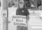 Residents of Atlanta and surrounding communities joined together on Oct. 6, to participate in the Life Chain event downtown. Life Chain is a Christian, prolife organization and those who participated had a time of silence and prayer. Photos by Raydeen Edwards