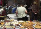 One thing to notice about community gatherings in the former Huffines School building is that there’s plenty of food, even when not called for. Here this table is described as “finger food.”