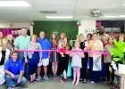 Two ribbon cuttings welcome two new specialty stores in one