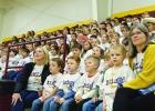 McLeod students in their honor award tee-shirts are all attention as they are being told how to throw the confetti they’ll soon receive. The adults are Britanny Hobbs, Brenda McCoart, Beth Byargeon and Tammy Logan. McLeod named‘Blue Ribbon School’