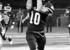 Cooper McClure catches a pass over his shoulder. Rabbits drop non-district game to Buckeyes