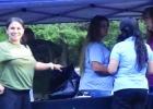Tanya Beers, owner of Caffe Creme in Atlanta, waits to speak with Red River Credit Union employees who are sponsoring a table at the 4th annual Trail Grinder run.The RRCU was one of the first sponsors of the benefit event. Tanya Beers, owner of Caffe Creme in Atlanta, waits to speak with Red River Credit Union employees who are sponsoring a table at the 4th annual Trail Grinder run.The RRCU was one of the first sponsors of the benefit event.