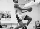 Kameron Dickerson sails through the air for two points in the Rabbs’ bi-district win over Winnsboro last week. Rabbs reach regional semi pinnacle for first time in 25 years