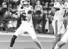Freshman QB Brayden Thompson drops back to throw the rock against the Lions. Photo by Susan Lindsey