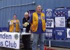 The community-minded Linden Lions Club is boosting the Linden Tigers with an annual school quilt drawing. The Lions are, from left, Bill Thomas, Mary Dowd, the Rev. Kara Mitchell, Paul Ellinger and Clifton Trusty. Each year, among other items, the club aw
