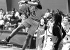 Queen City’s Daketrick Smith goes airborn against DeKalb. Photos by Susan Lindsey