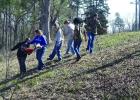 These Linden-Kildare High School students are having fun getting wild flower seeds to throw.The wild flowers will highlight the planned brick-making memorial site. Linden City Park