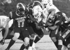 Queen City’s defense wraps up an Elysian Fields ball carrier. Photos by PHYLLIS WARREN Queen City Homecoming 2024