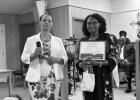 Brittany Surratt presents a gift to Vonzear Mitchel during Pleasant Hill Missionary Baptist Church’s 182-year-old celebration.