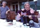 Playing guitar at the white table is Tammie Marler of Texarkana.She is with Raul Suarez of Columbia, South America.The two are doing event promotions.Tammie is a singer and song writer who has moved here recently from California. MOONLIGHT MADNESS 2023