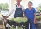 George Echols donates watermelons to Golden Villa and is pictured with Pam Romanick
