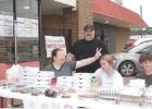 Clowning around while waiting on customers are these members of Sand Hill Assembly of God Church near Bloomburg. They are holding a bake sale at Price Hardware to send youth to summer camp.They are, from left, Remington Dawson, Craig Johnson, Leah Johnson