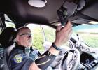 APD Officer Marty Spriggs plays back video of a traffic stop recorded on the new WatchGuard dash cam. (Photo by KATE STOW) APD goes HD