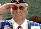 The late Cleo Duncan remembers as he salutes. SALUTE